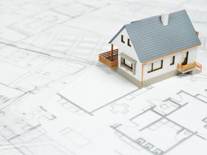 House on blueprint with copyspace
