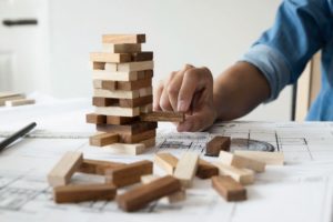 Playing Jenga on top of architecture drawings