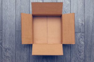 Open Box against grey flooring