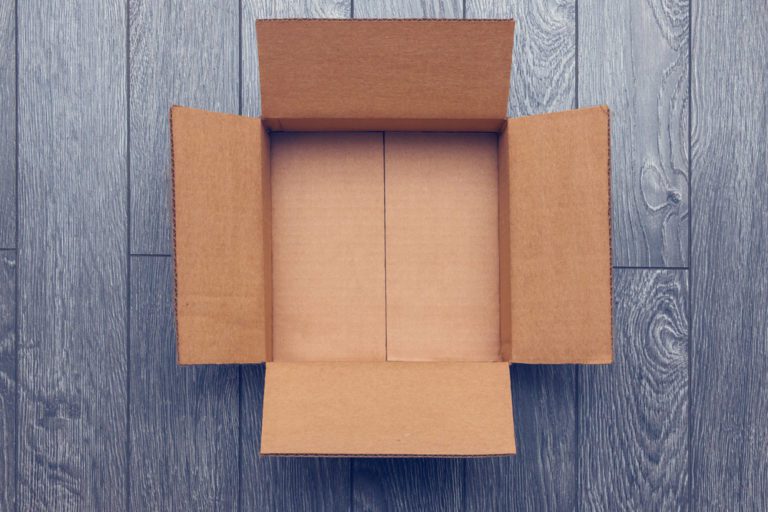 Open Box against grey flooring