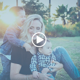 Woman and kids smiling and enjoying life