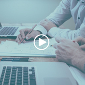 A financial planner explaining the tax advantages of a whole life policy